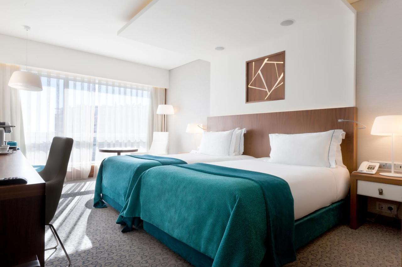 โรงแรมอีปิก ซานา ลิสบัว ลิสบอน ภายนอก รูปภาพ A room at the hotel