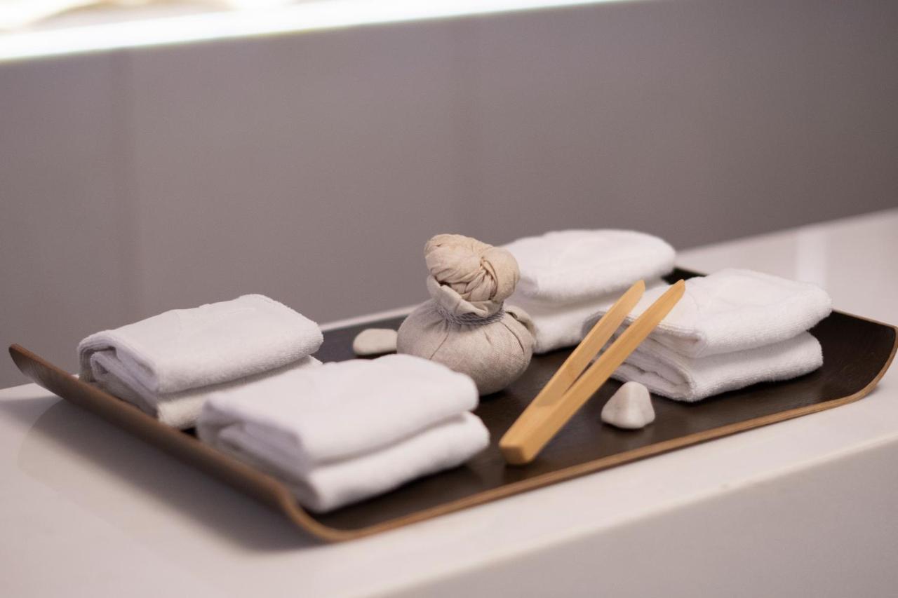 โรงแรมอีปิก ซานา ลิสบัว ลิสบอน ภายนอก รูปภาพ A set of folded towels