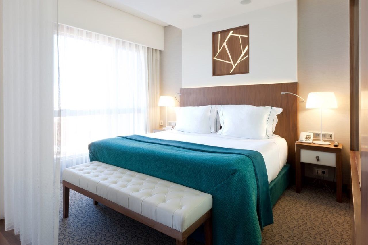 โรงแรมอีปิก ซานา ลิสบัว ลิสบอน ภายนอก รูปภาพ A bedroom at the hotel